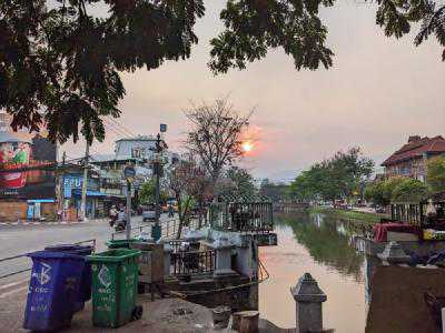 Sunset over the moat next to the Chang Mai city walls