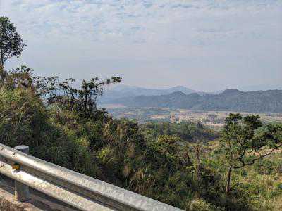 A view of mountains and field from the famous Ho Chi Mich trail