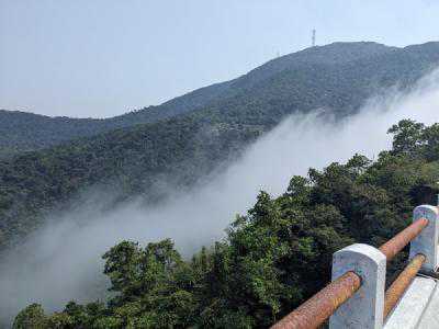 clouds rolling over the mountain top at Hai Van Pass